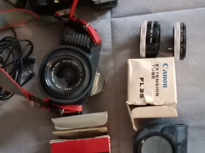 Canon T70 multiple program AE dual metering system con acc.