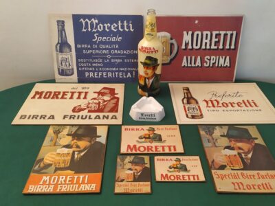 Il bevitore con baffi e cappello nell'etichetta birra morett